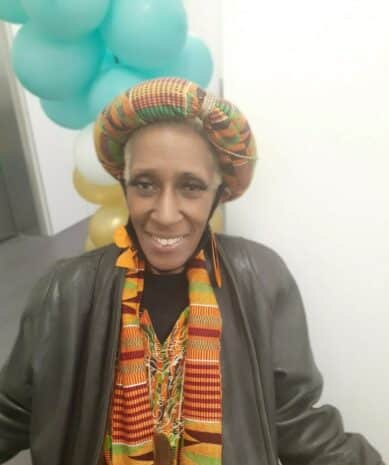 Wellness Day participant after getting makeup done by Hair Academy II